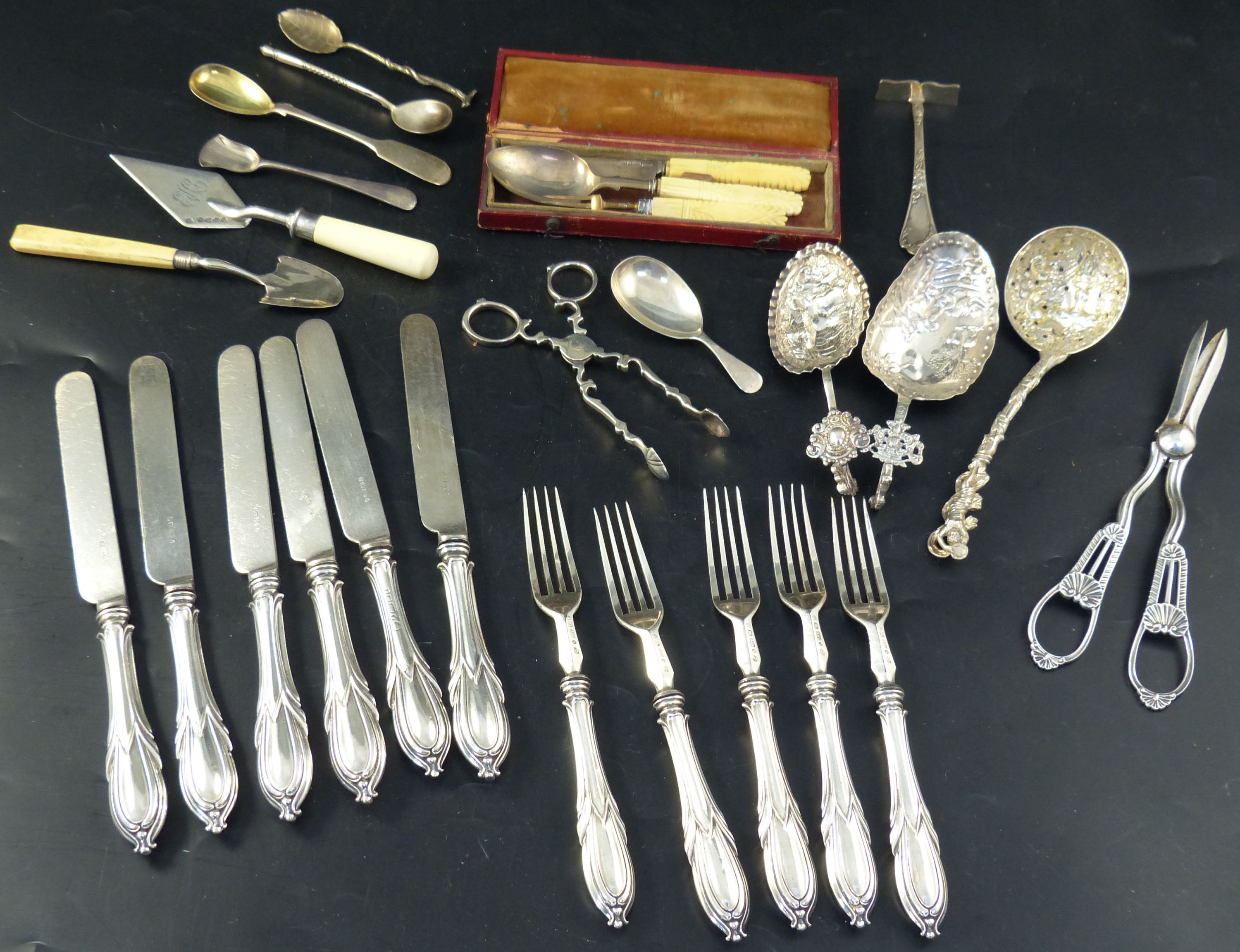 Mixed silver and plated cutlery